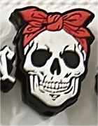 SKELETON  HEAD WITH BOW